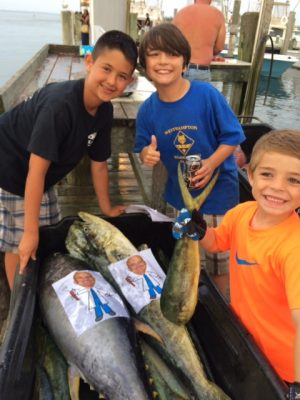 Boy are playing with fish Boy are playing with fish